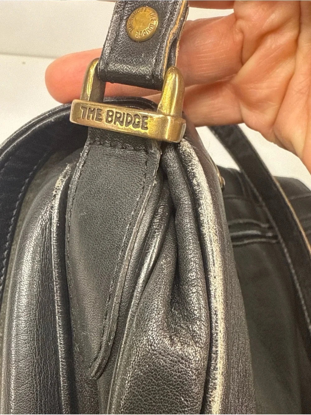Classic Black Leather Crossbody Saddle Bag by The Bridge